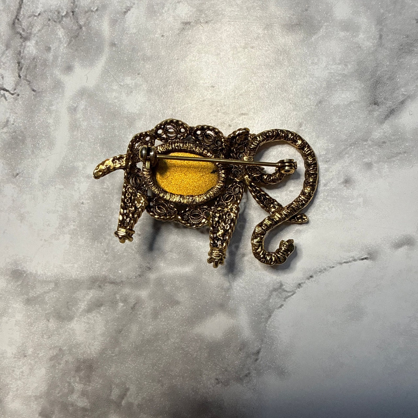 Vintage Elephant Brooch with Green Glass Cabochon and Rhinestone Accents