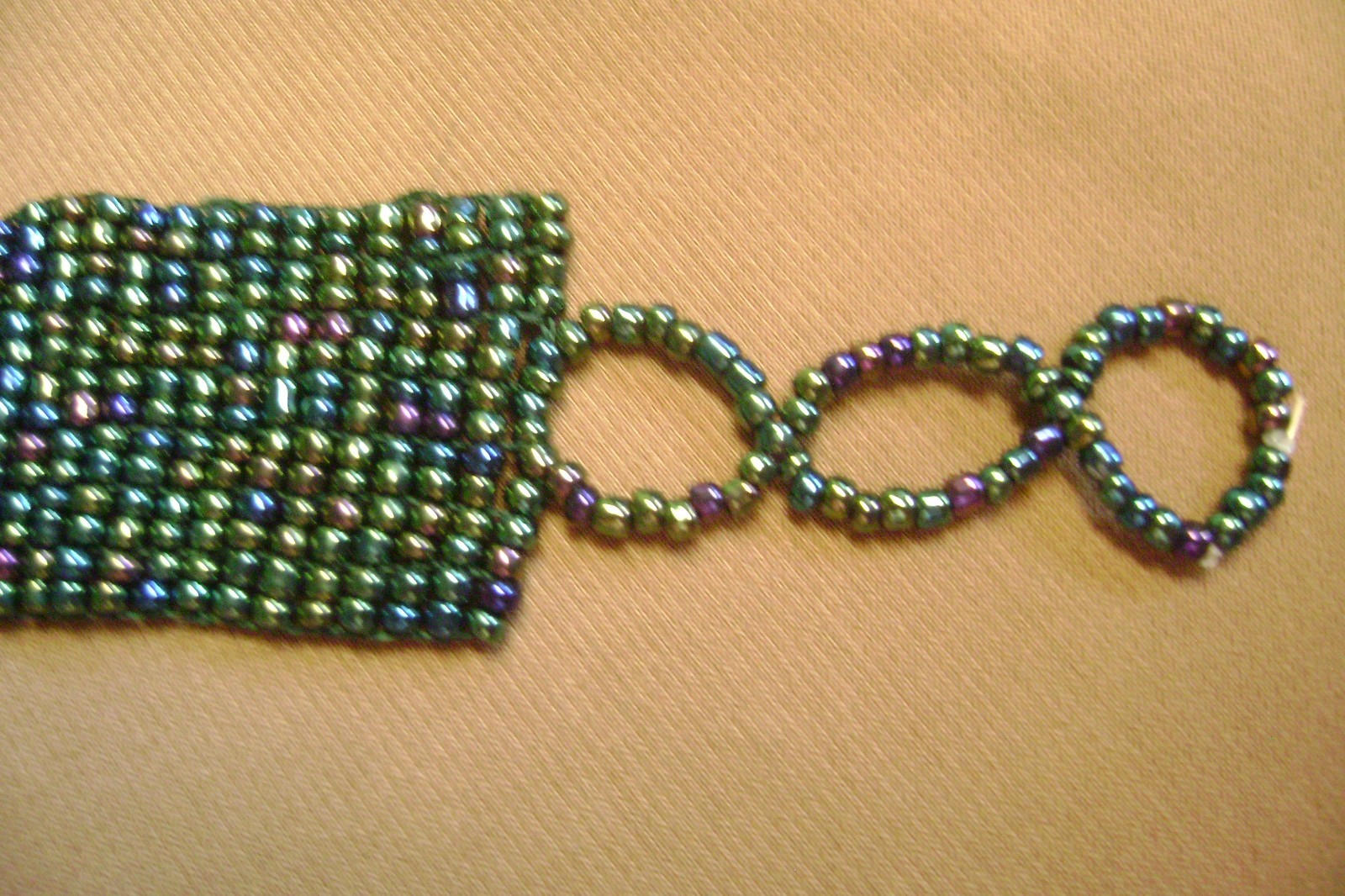 VTG- WIDE MULTICOLOR GLASS SEED BEADED LARGE CENTER FLOWER ADJUSTABLE BRACELET