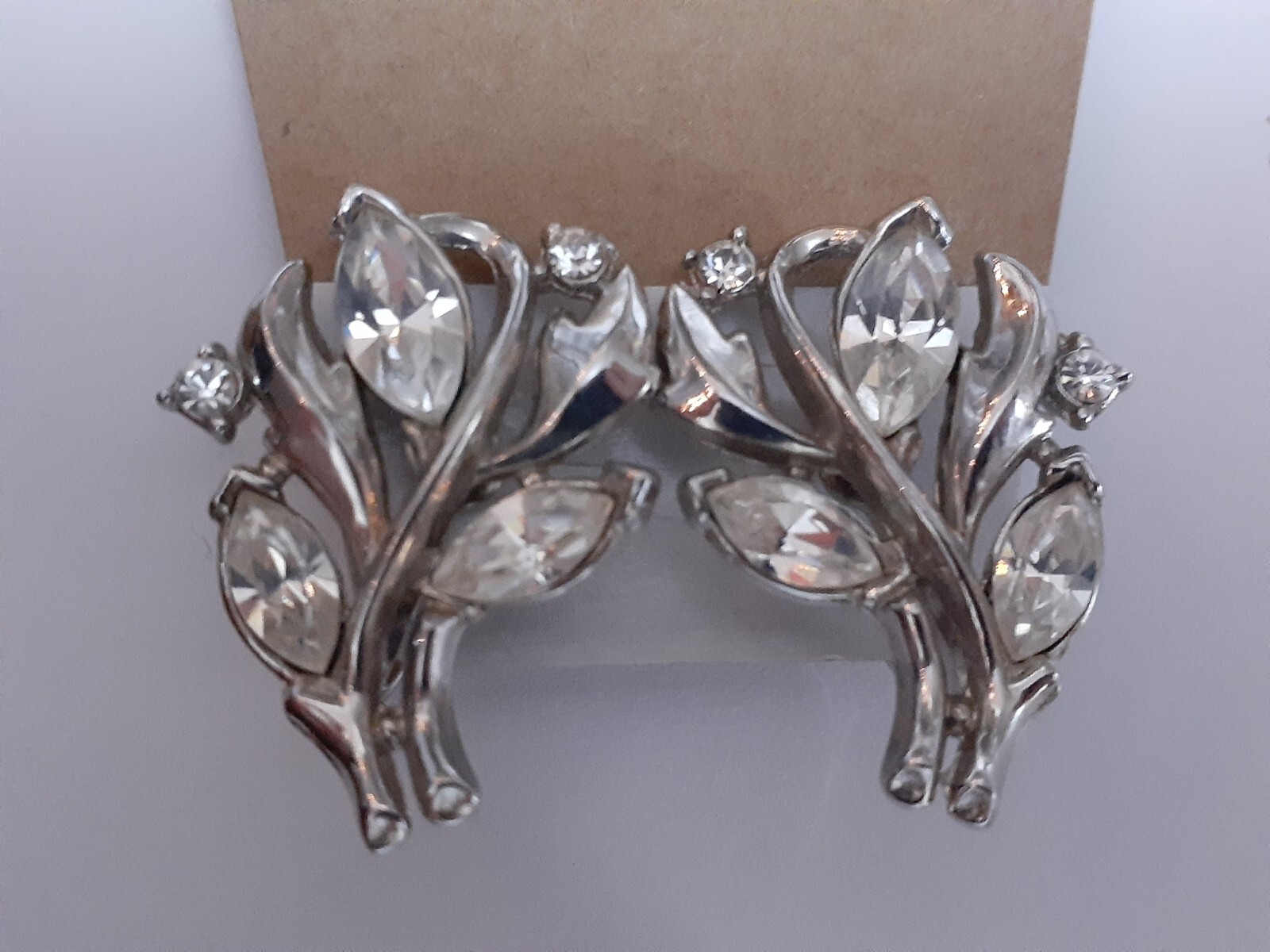 Vintage Crown Trifari rhodium plated marquise cut rhinestone clip on earrings