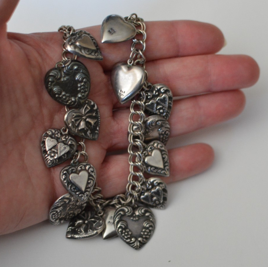 Signed PAJ 925 repousse multiple heart charms necklace 58 grams 24 inches long