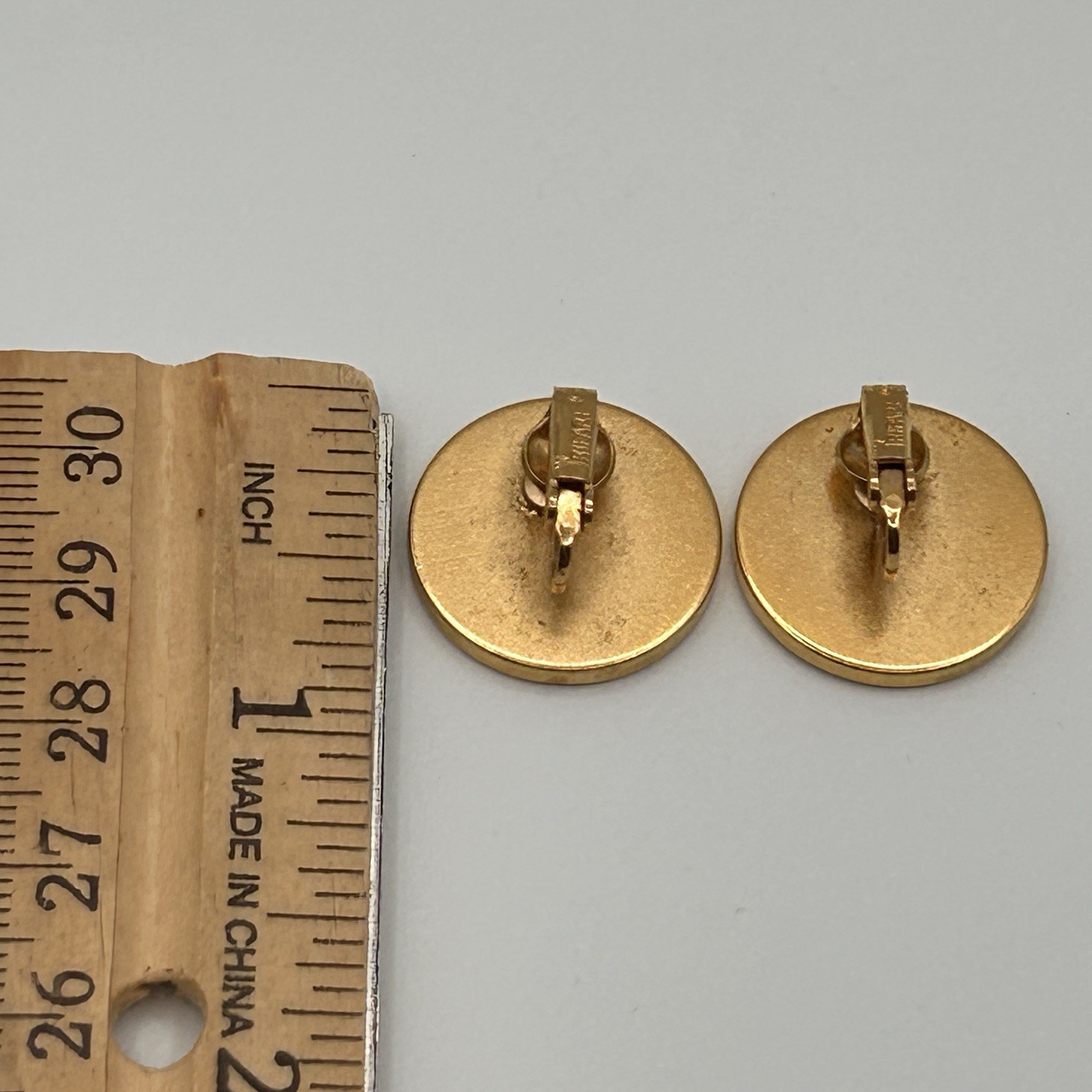Vintage Trifari Clip On Earrings Gold tone Round Flat Signed .75″