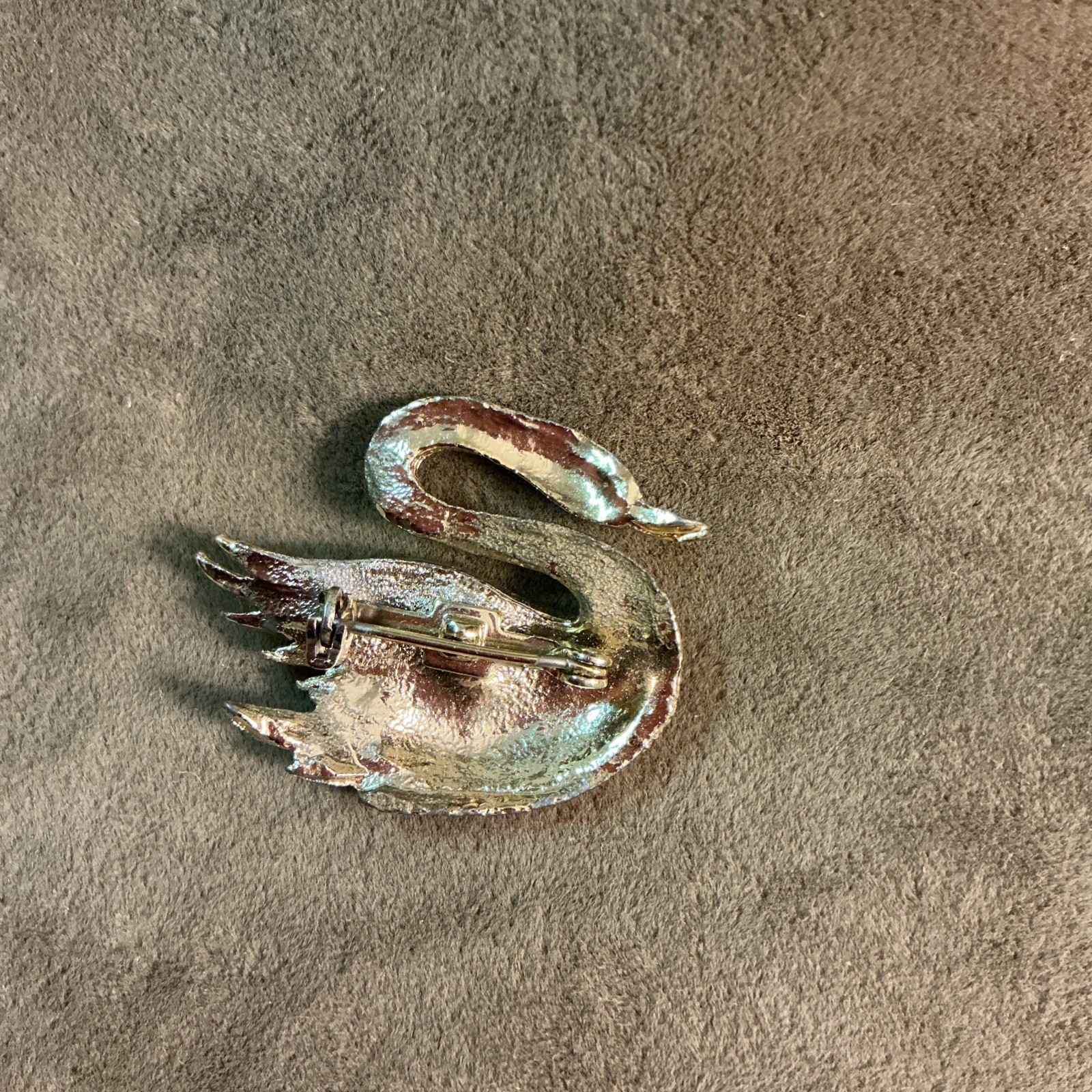 Vintage unsigned Gerrys Silvertone Metal Swan Design Pin Green Rhinestone Eye