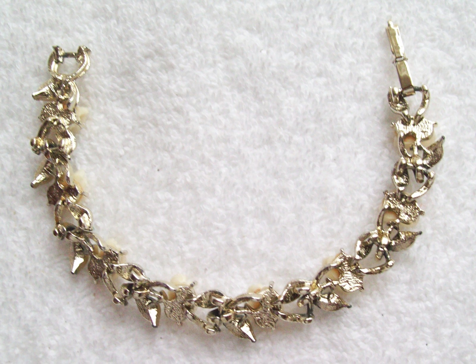 Vintage White Acetate Plastic Roses and Green Enamel Leaves Linked Bracelet