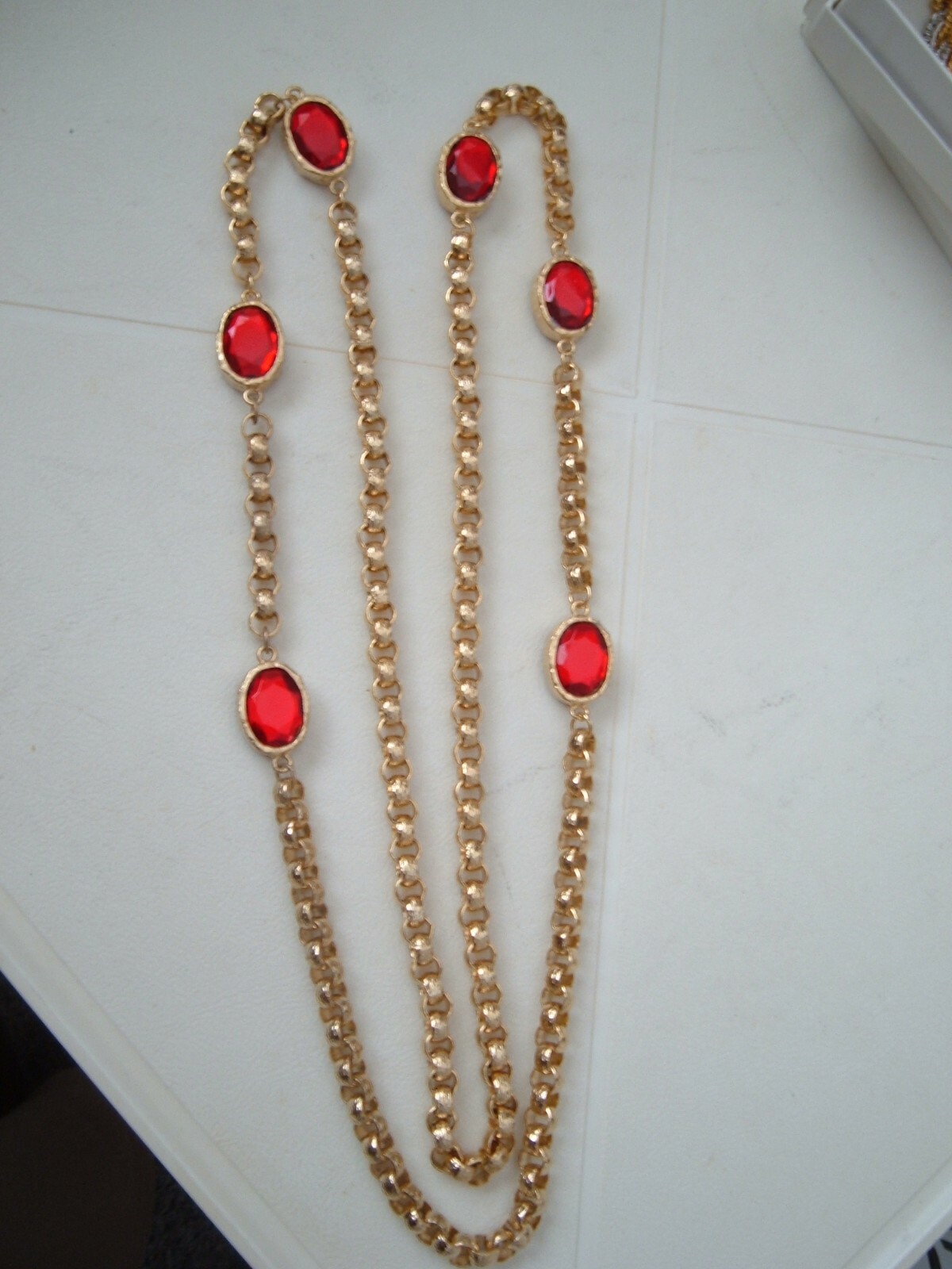 “Unknown” Designer – (Long Gold Tone Crystal Necklace)
