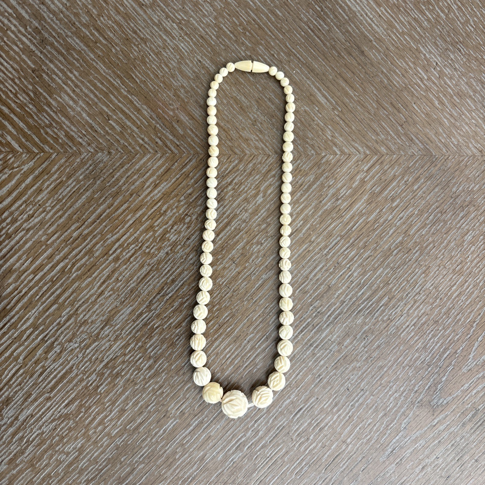 Vintage Hand Carved Bleached Graduated Bead Necklace 18″