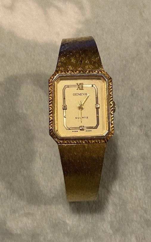 Vintage Geneva Quartz Wristwatch Gold Tone Case And Band
