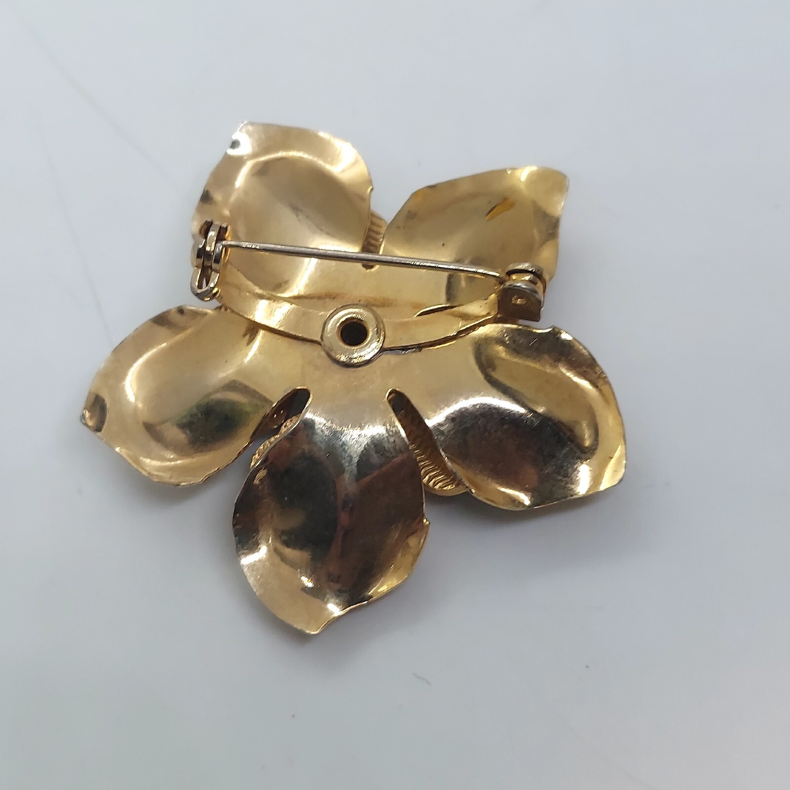 Vintage Gold Tone Black Enamel Flower Brooch With Aurora Borealis Rhinestone