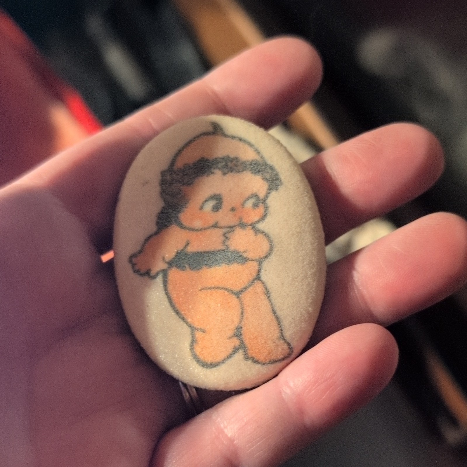 Kewpie Doll On Oval Shape With Felt Back