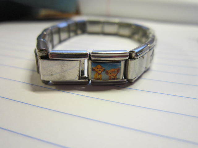 Stainless Steel Link Stretch Charm Bracelet Disney Lion King Diploma Flute Smile