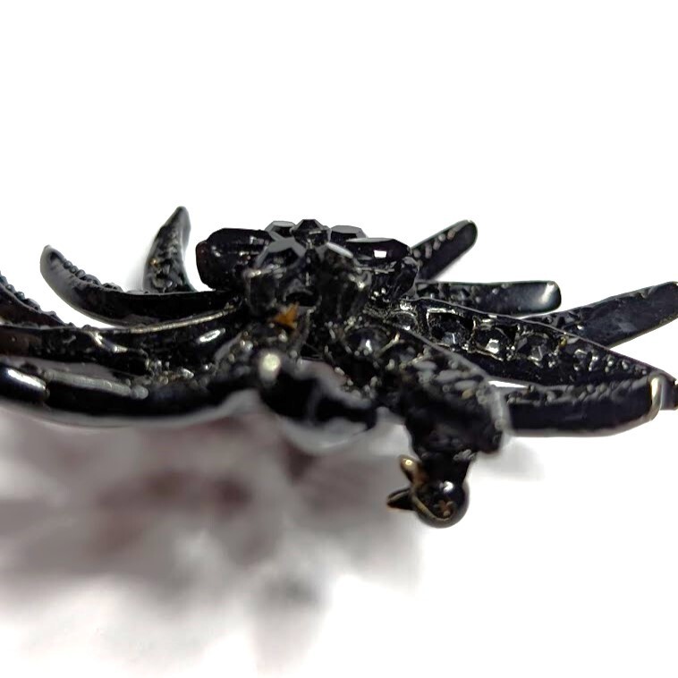 Vintage Mourning Brooch Black Rhinestone Japanned Pinwheel Signed Unreadable