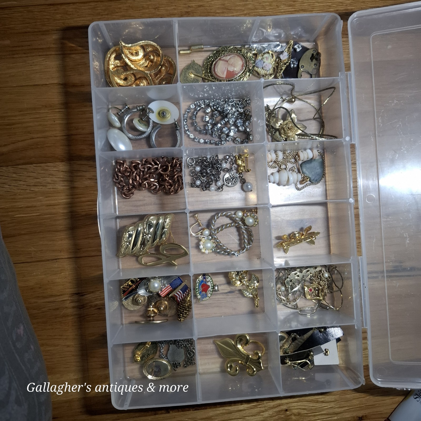 Vintage jewelry lot Broaches earrings charms bracelets Necklace Pins And more