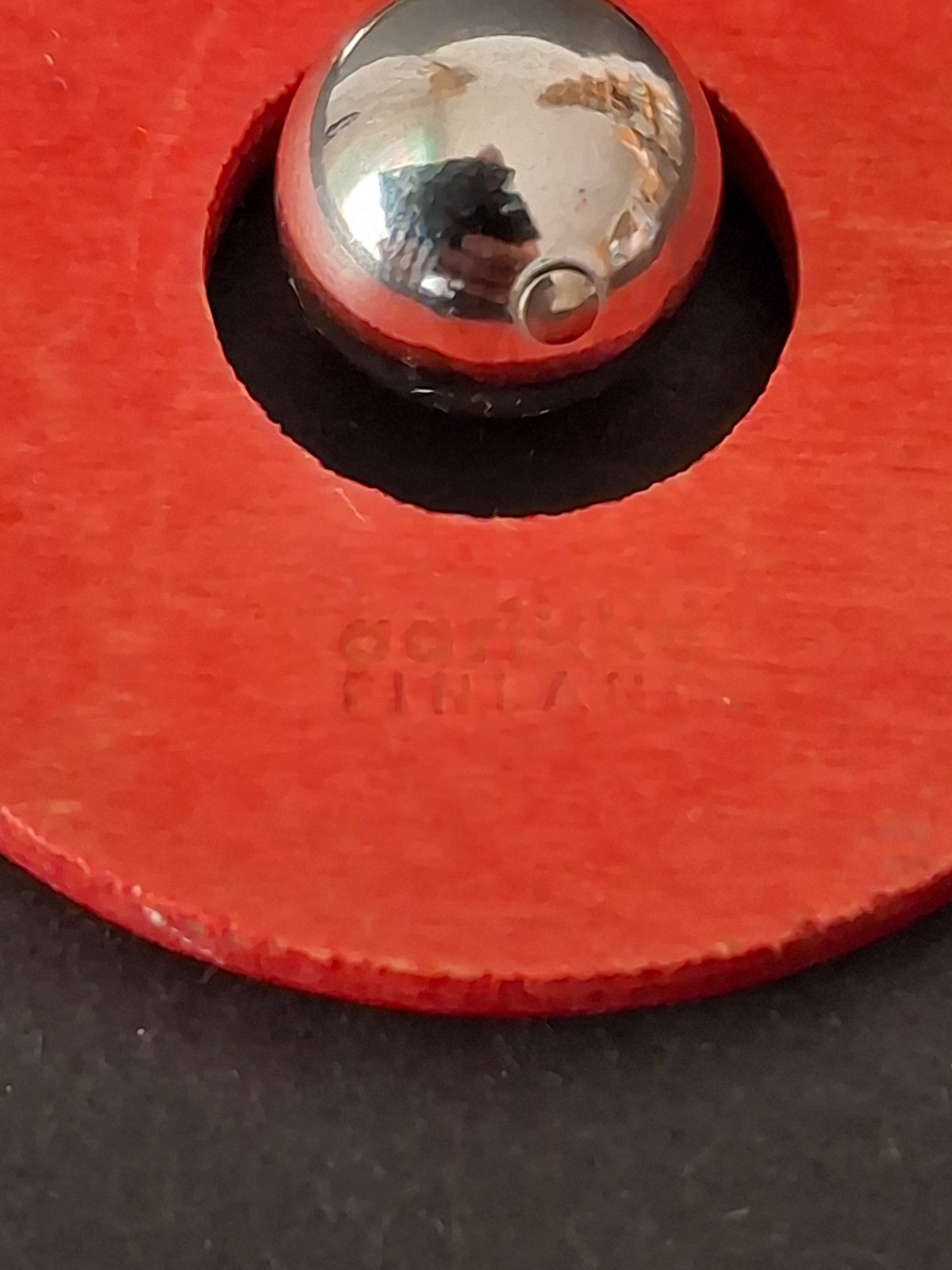 Aarikka Finland necklace with a vibrant red wooden ring pendant