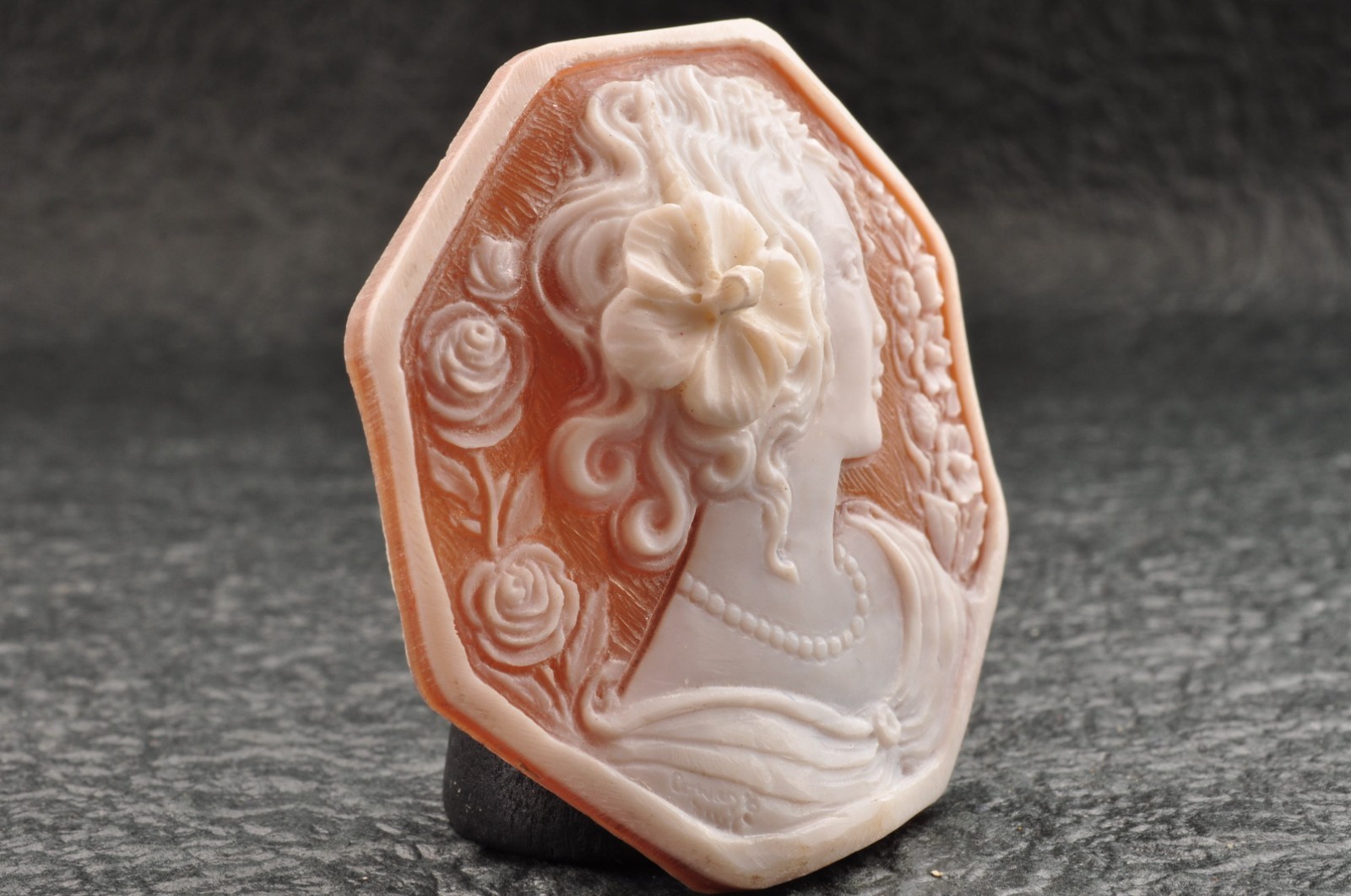 Vintage shell cameo “Girl with a flower hair ornament”, (65.0ct) sign by artist.