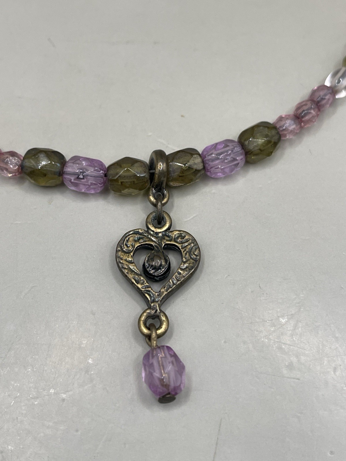 VTG 1928 Brand Memory Wire Chocker Bronze Tone Beaded Heart Pendant Necklace