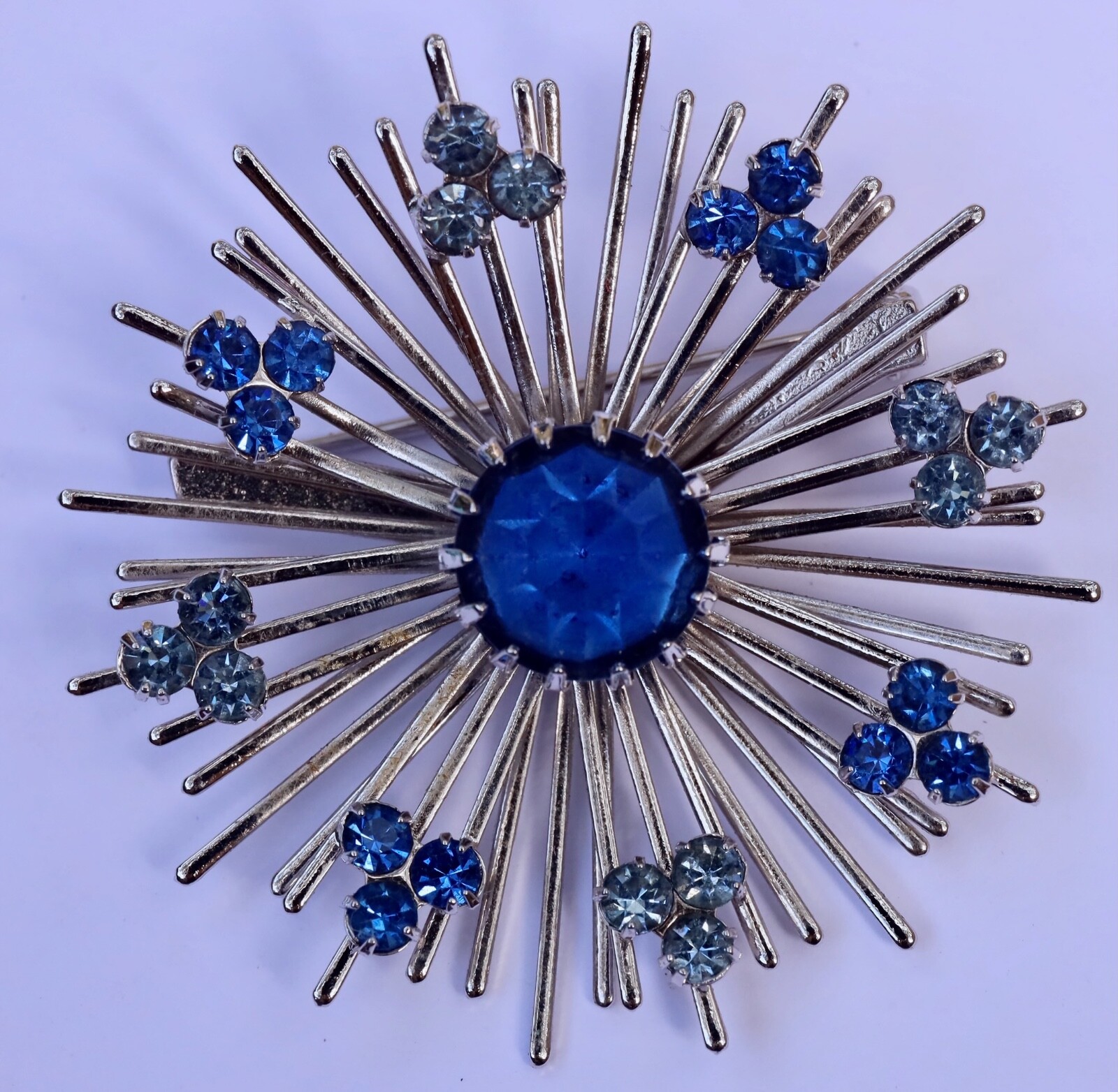 Sarah Coventry Signed “Coventry” Silver Tone Starburst Brooch Blue Rhinestones