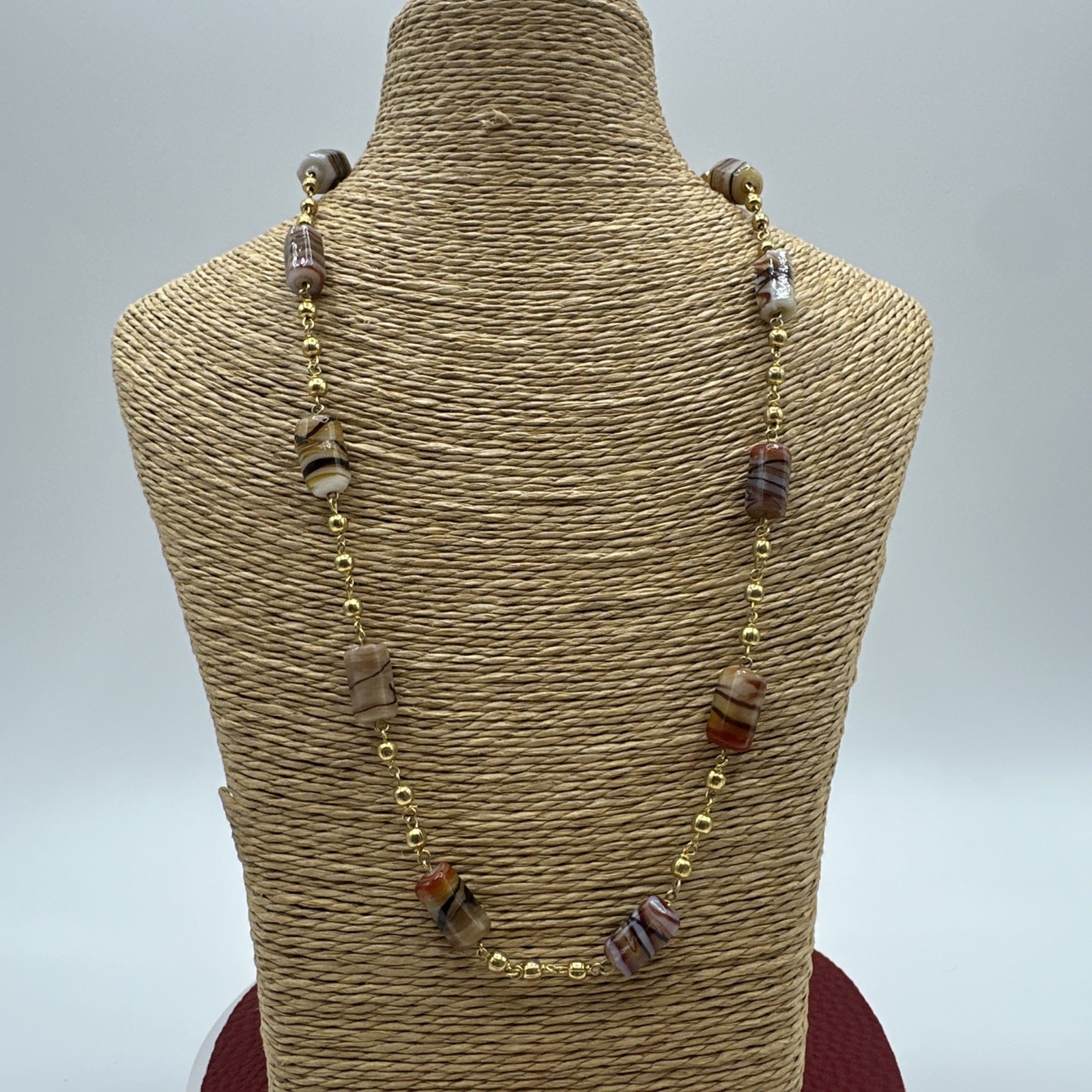 Vintage Glass Beads and Gold Tone Necklace. It’s 18” long. See pics.