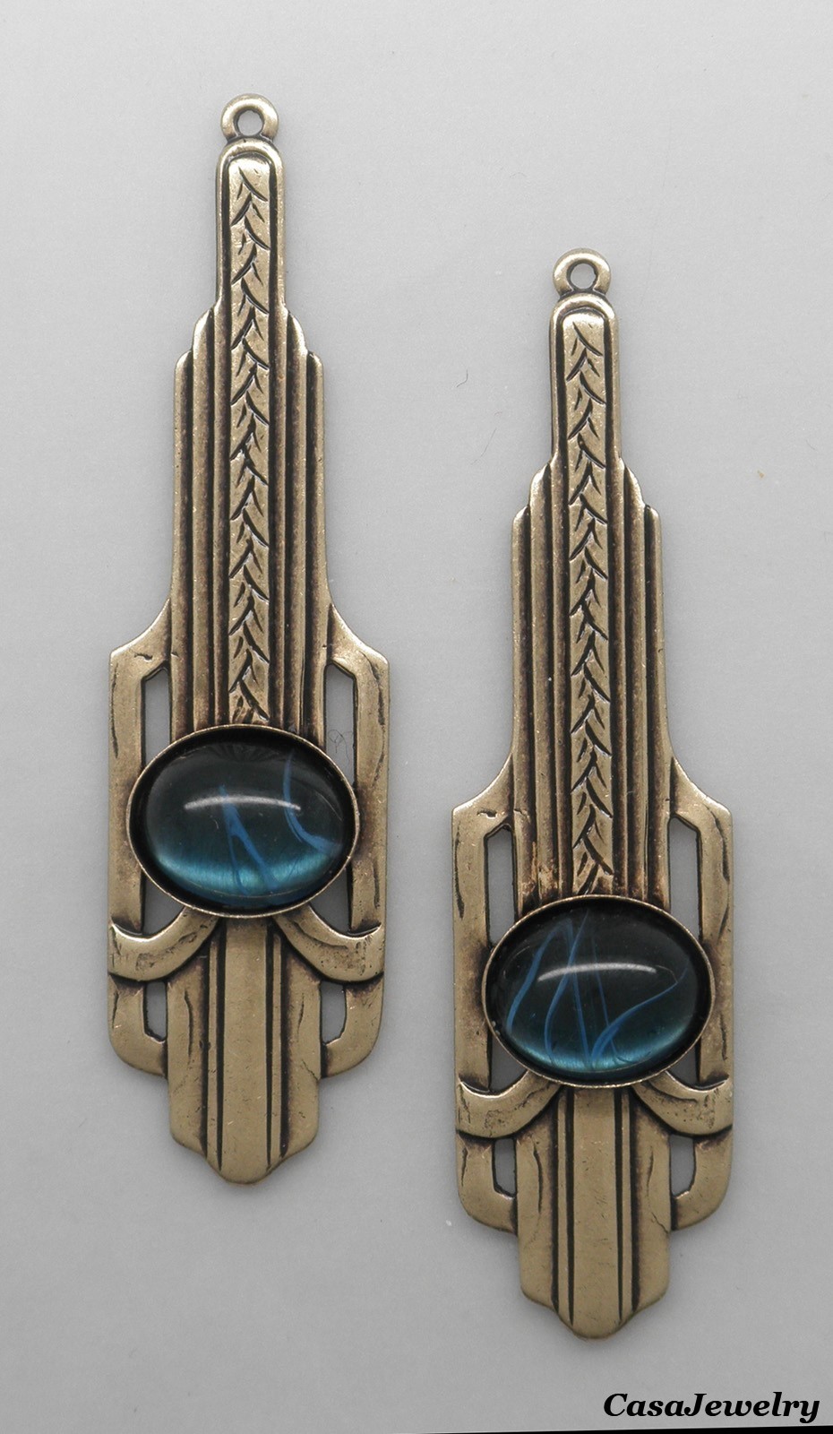 #0183MB ANTIQUED GOLD ART DECO DROP W/10x8mm MONTANA BLUE CABOCHON- 2 Pcs