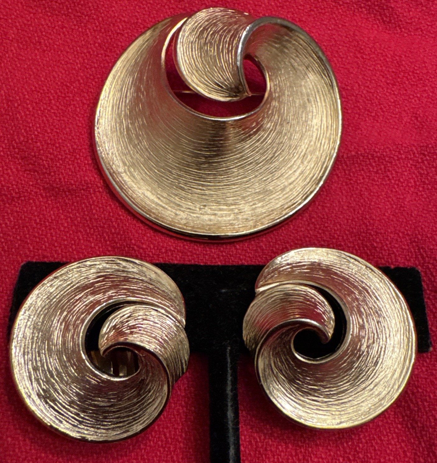 Vintage Crown Trifari 1 3/4” golden swirl brooch with 1” clip on earrings