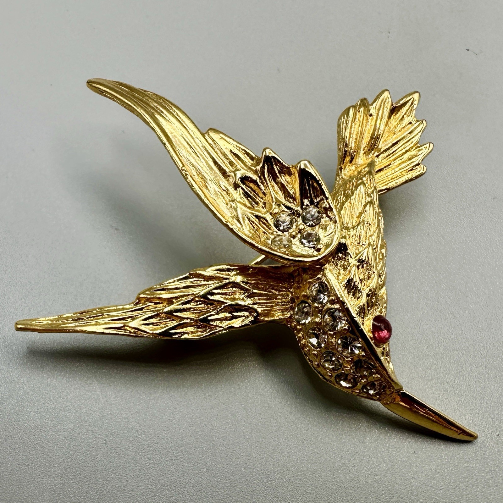 Vintage Hummingbird In Flight Brooch Pin Gold Tone Clear Rhinestones Red Eye 3D