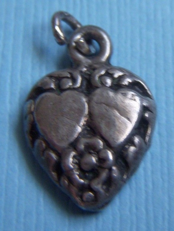 Vintage 40’s solid heart sterling charm