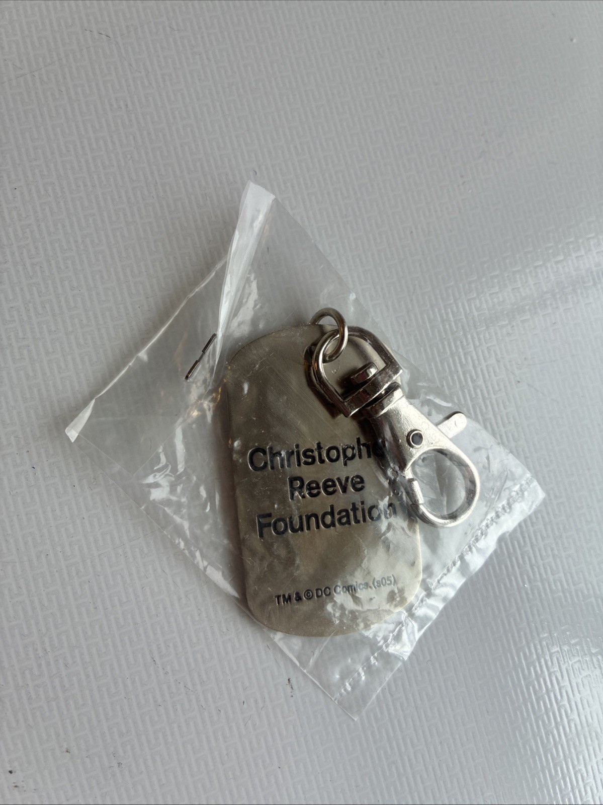 Christopher Reeve Foundation, Superman “Go Forward.” Keychain, Dog Tag TM & DC