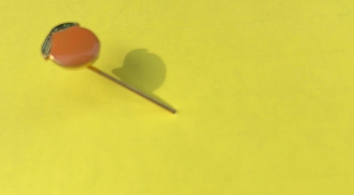 A Happy Vintage Orange Stickpin