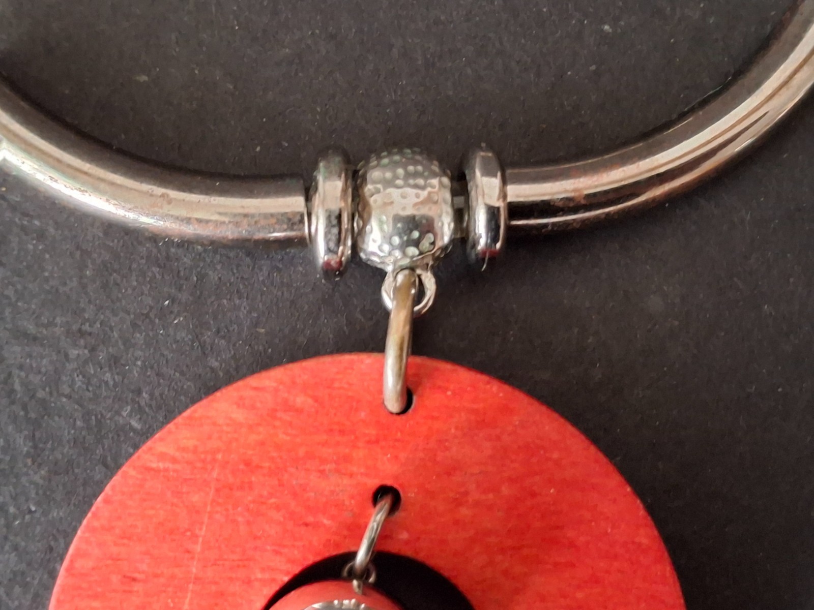Aarikka Finland necklace with a vibrant red wooden ring pendant