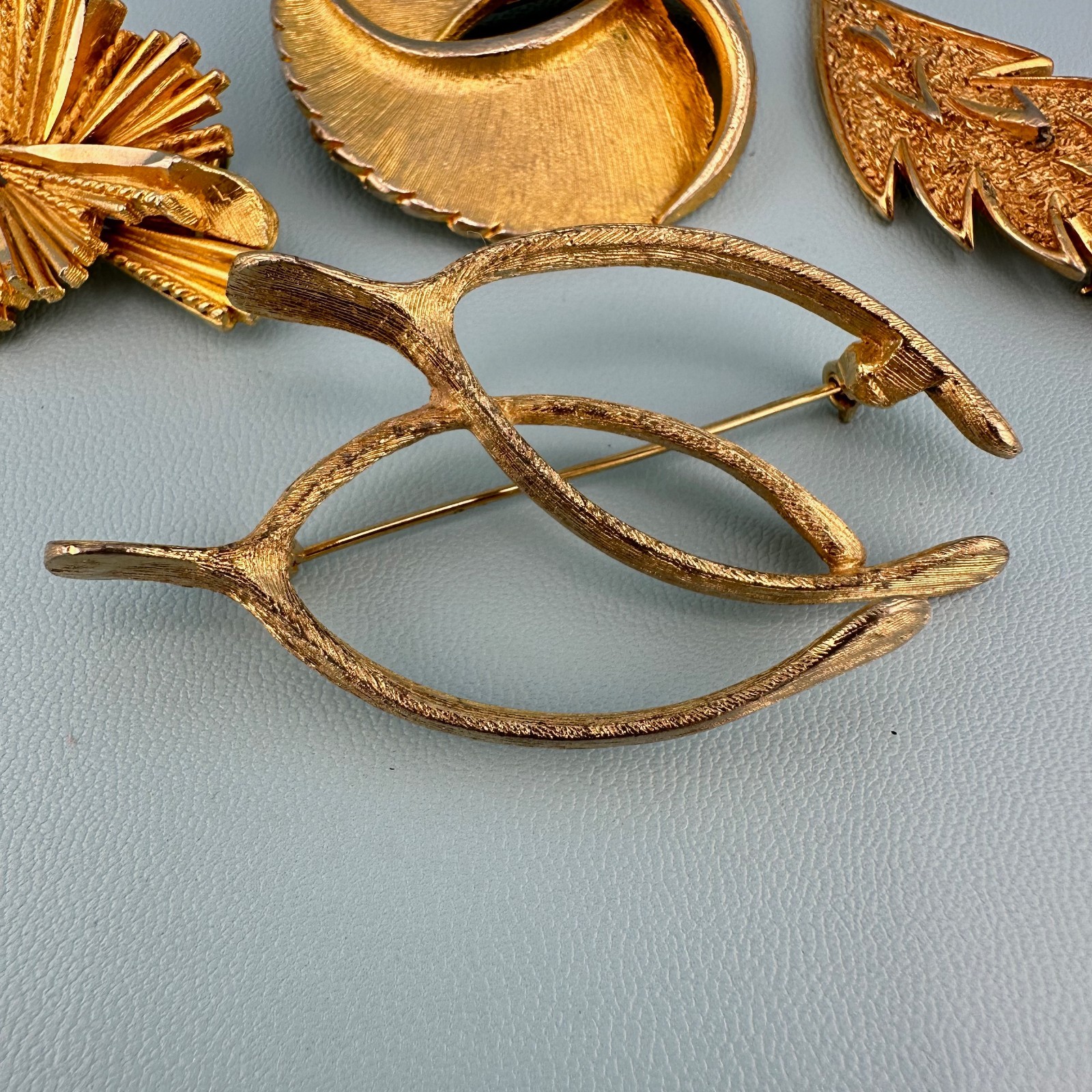 Vintage Designer Brooch Lot Gold Tone Textured Brushed Leaf Wishbone Signed