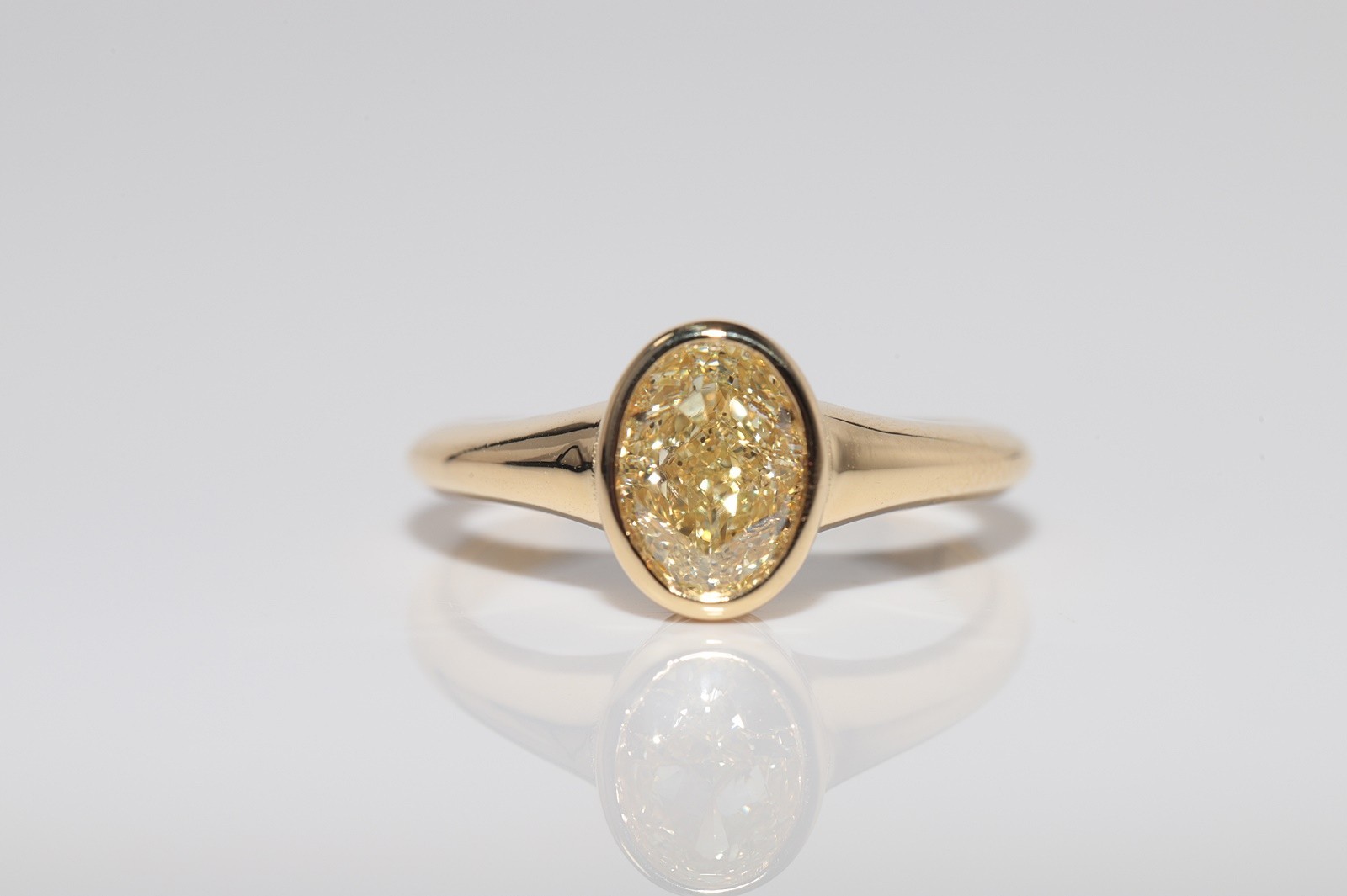 18k Gold 1.51 ct Light Fancy Color Oval Cut GIA Certified Solitaire Ring