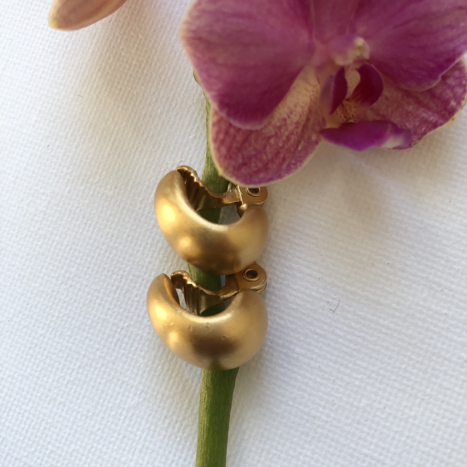 Vintage Monet Matte Gold-tone Chunky Clip-on Hoop Earrings.