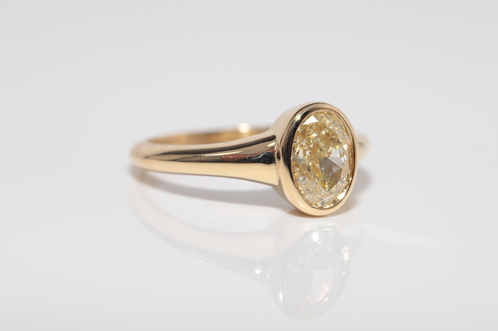18k Gold 1.51 ct Light Fancy Color Oval Cut GIA Certified Solitaire Ring