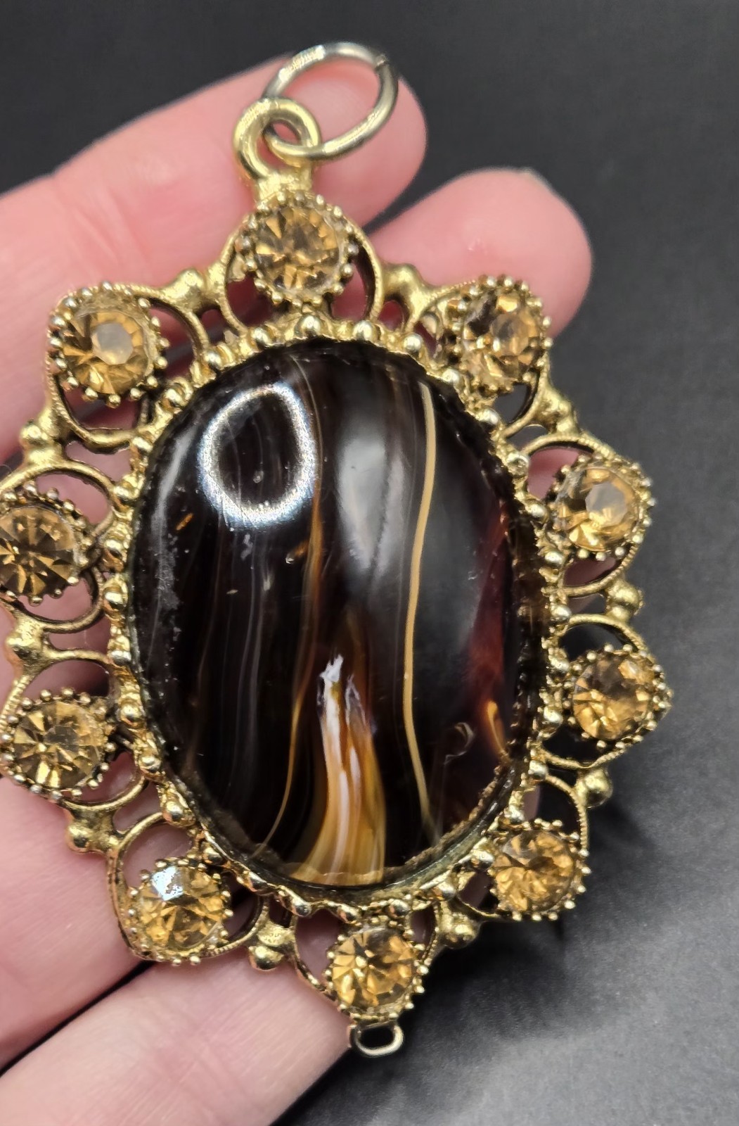 Vintage Ornate Gold Tone Oval Pendant Brown Black Stone Decorative Accents