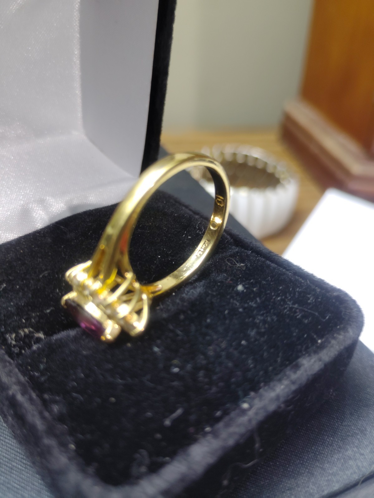 Vintage Amethyst Ring Set On An 18k Gold Band With White Saphire Accent Stones