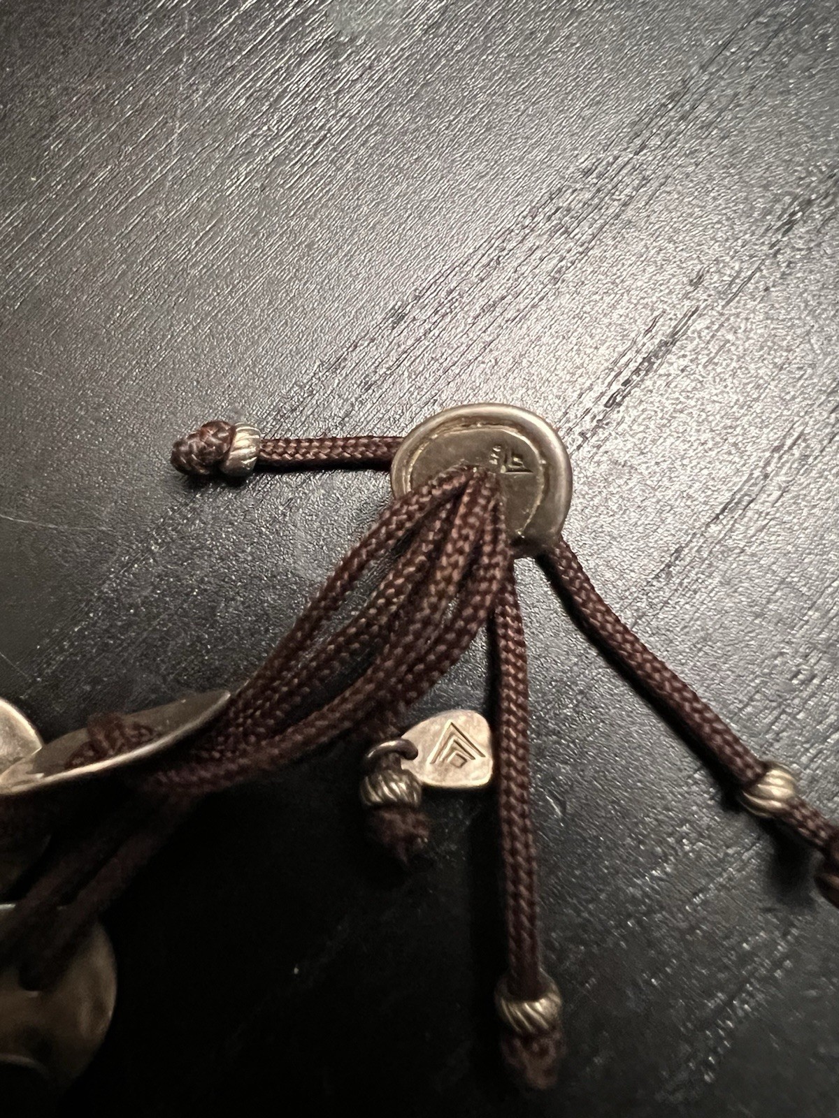 Silver Coin Bracelet with Tassel Accents