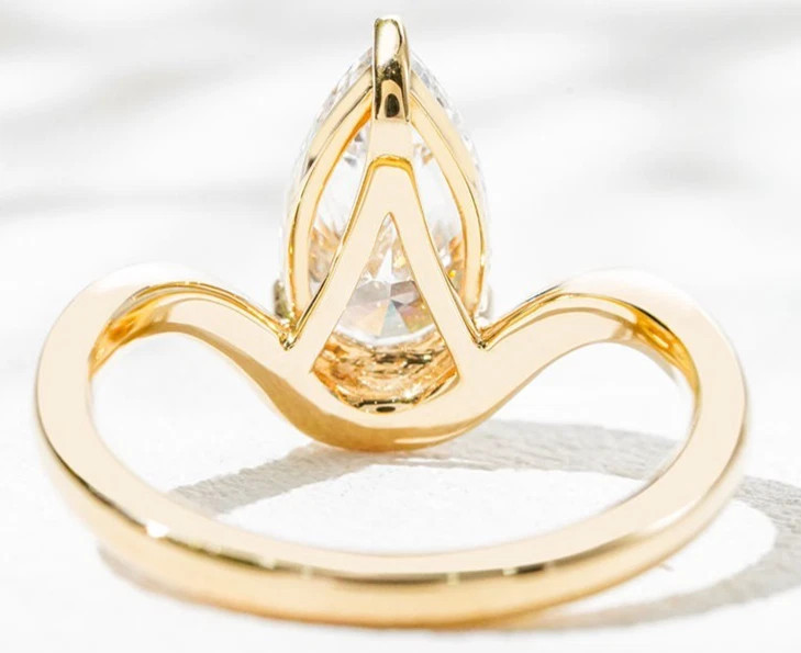 Pear & Round Cut 1.36TCW White Moissanite Wave Pattern Ring In 10K Yellow GoldFN