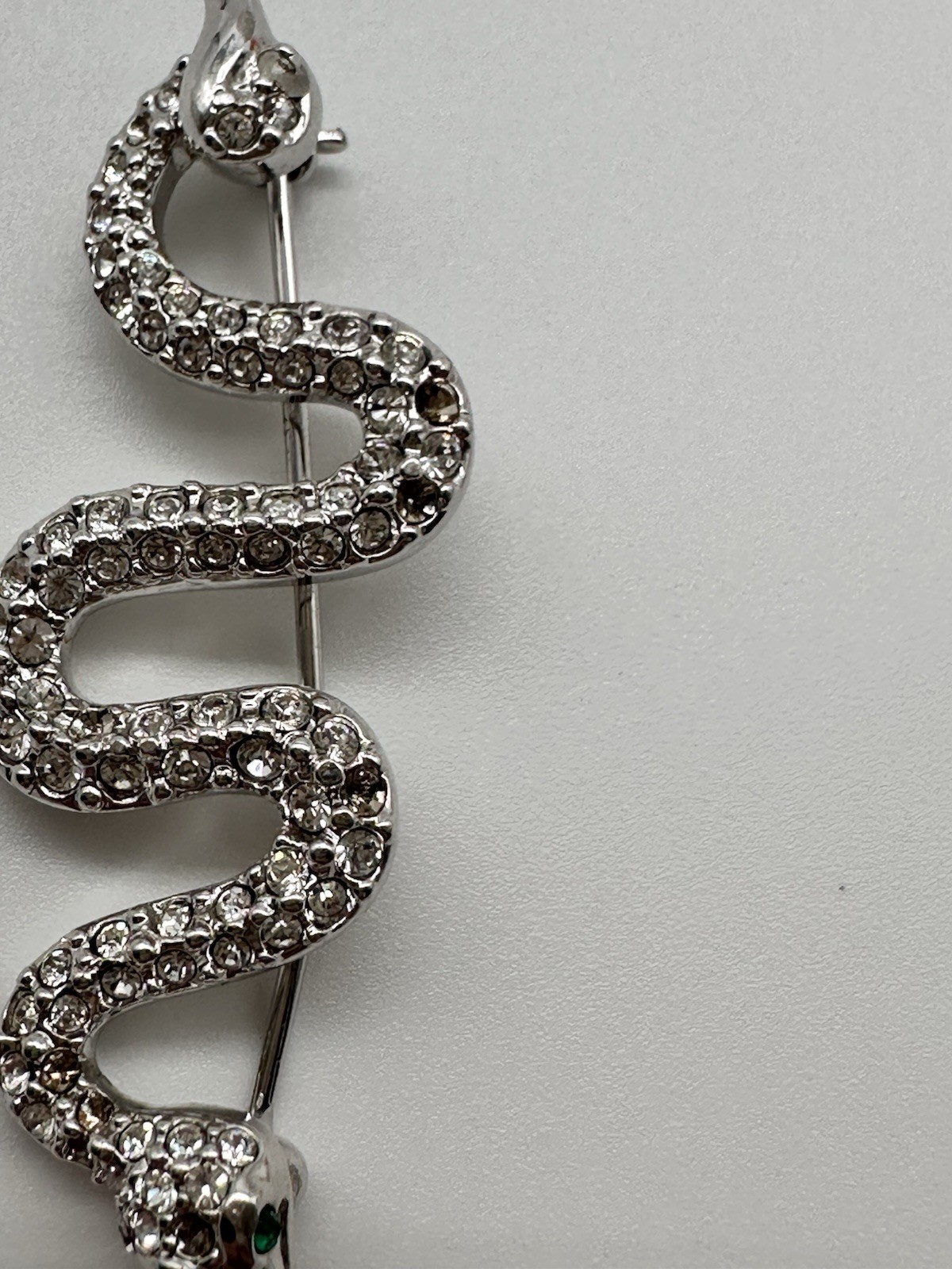 Vintage Swarovski Swan Silver tone Pave Crystal Snake brooch green eyes