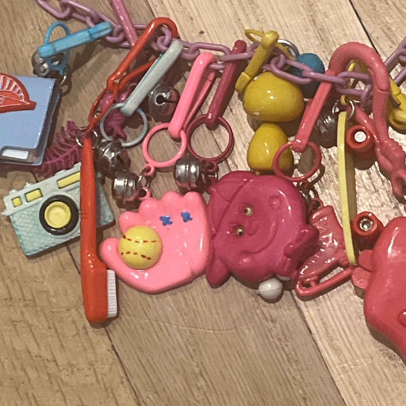 Vintage 1980s Plastic Clip-0n Bell Charm Necklace..20 charms