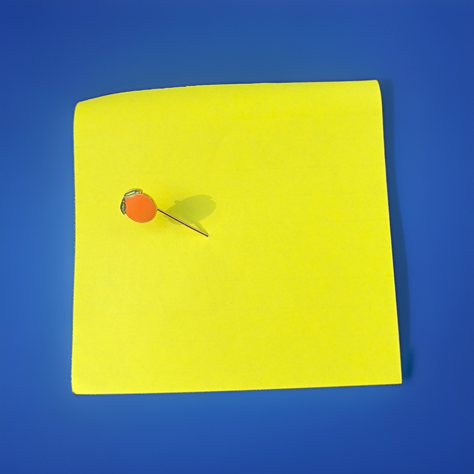 A Happy Vintage Orange Stickpin