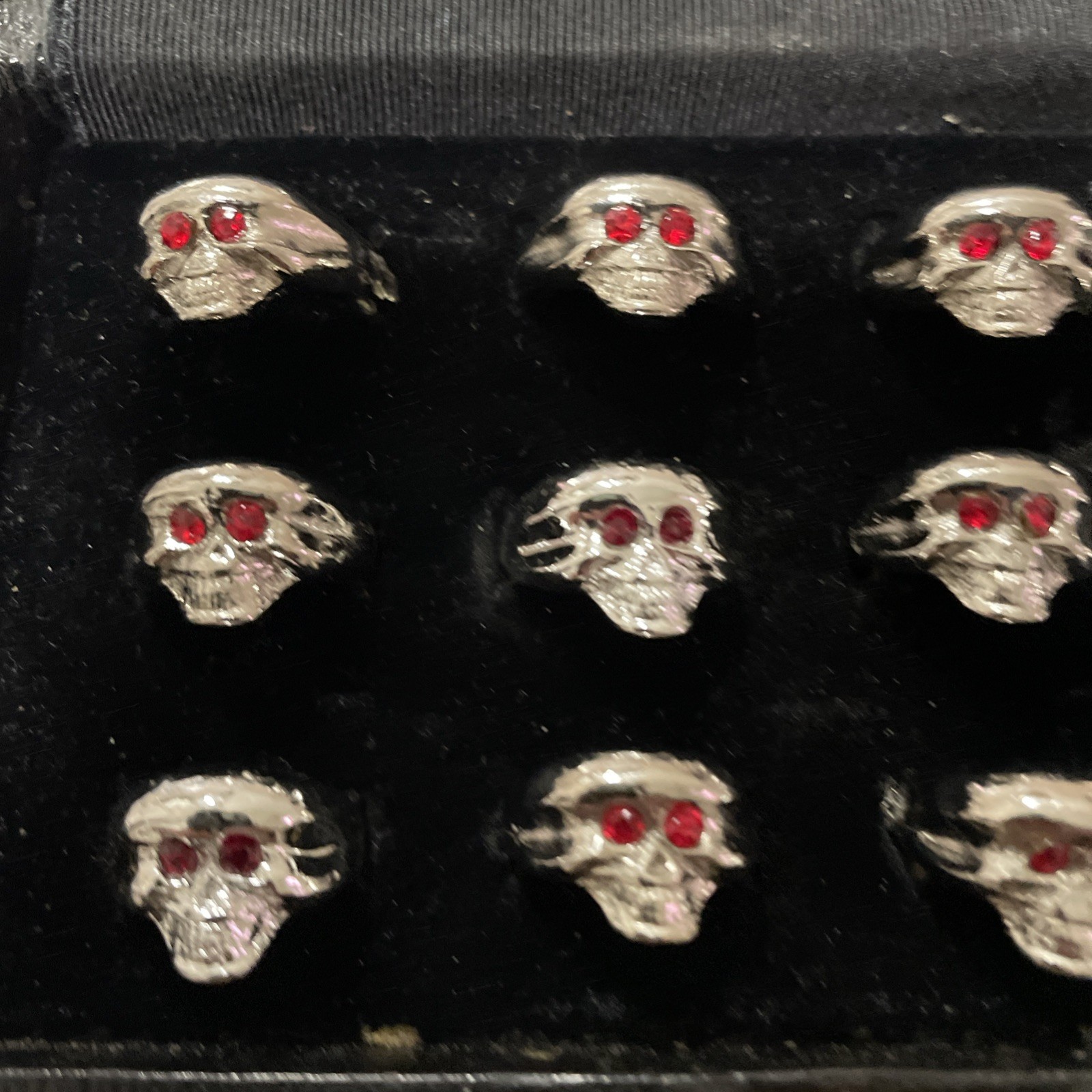 Lot Of 12 VTG NOS Silver Plate Skull Rings Red Eyes Assorted Sizes