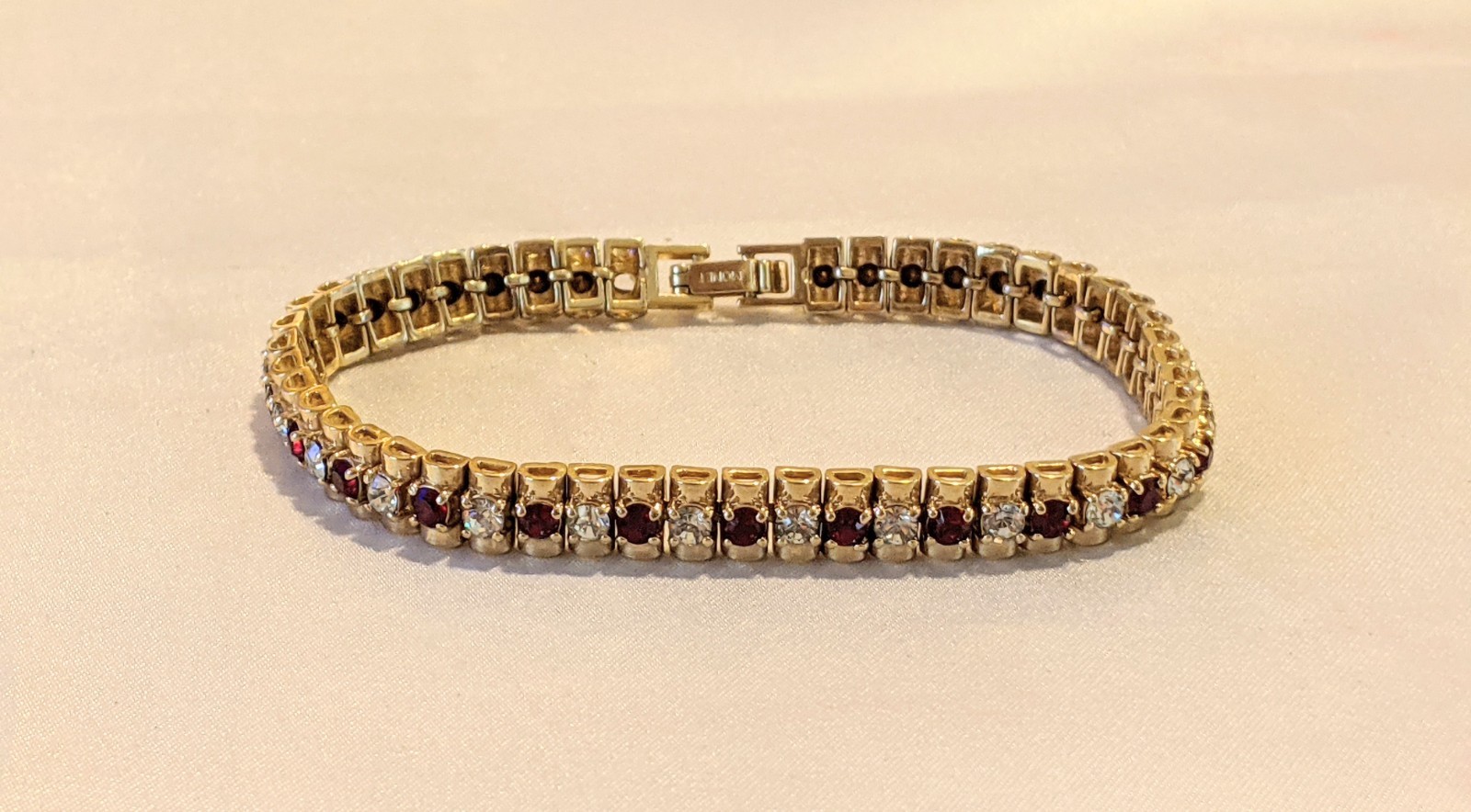 Vintage MONET Ruby Red & Clear Rhinestones Gold Tone Tennis Bracelet Signed 7″