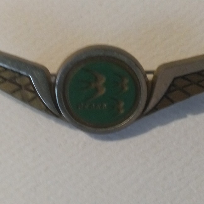 Stoffel Seals Signed Wing Brooch Pin Gold Tone Green Round Bezel Center