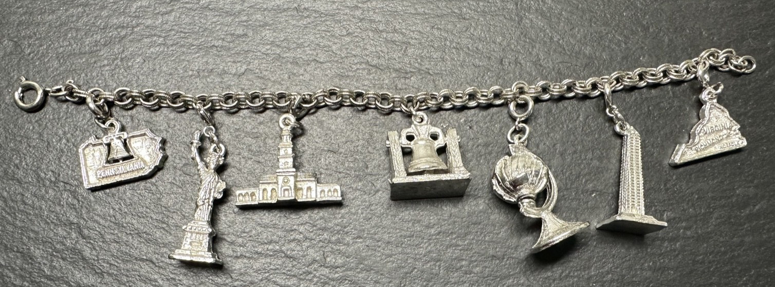 7 VINTAGE USA TRAVEL CHARMS & 7″ SILVER TONE BRACELET M195