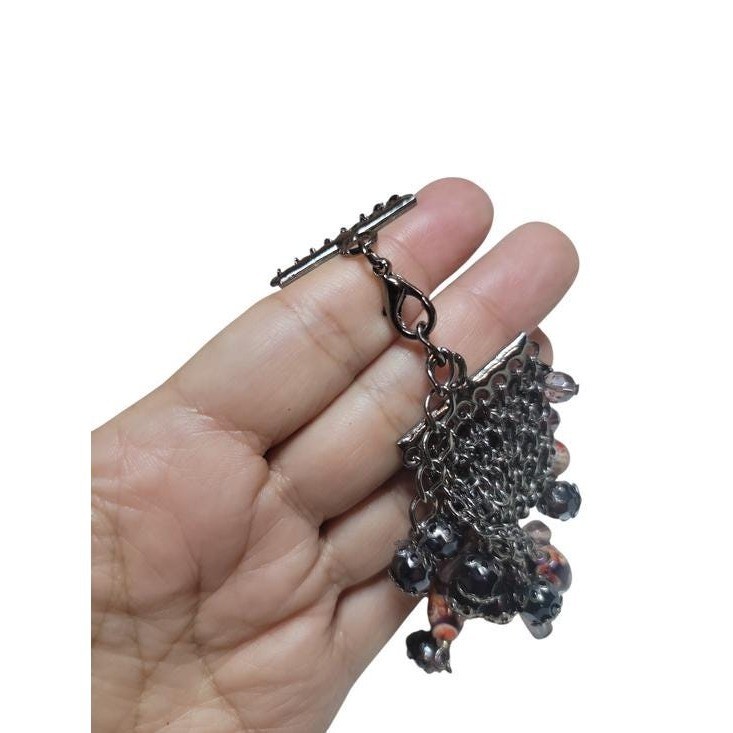 Striking vintage artisan beaded bracelet featuring a dramatic cluster fringe