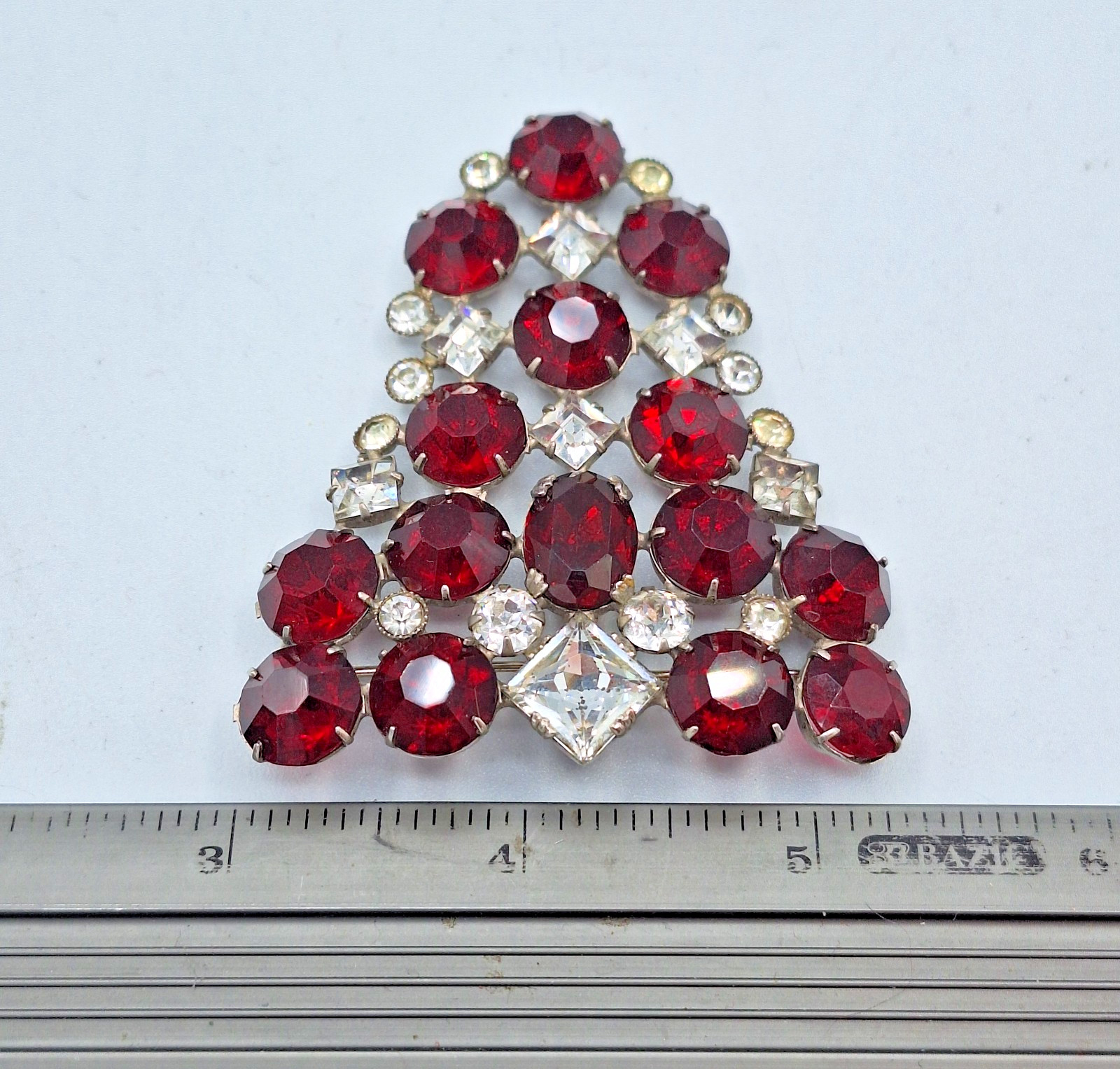 Red and Clear Rhinestone Triangular Brooch Unsigned 2.25″