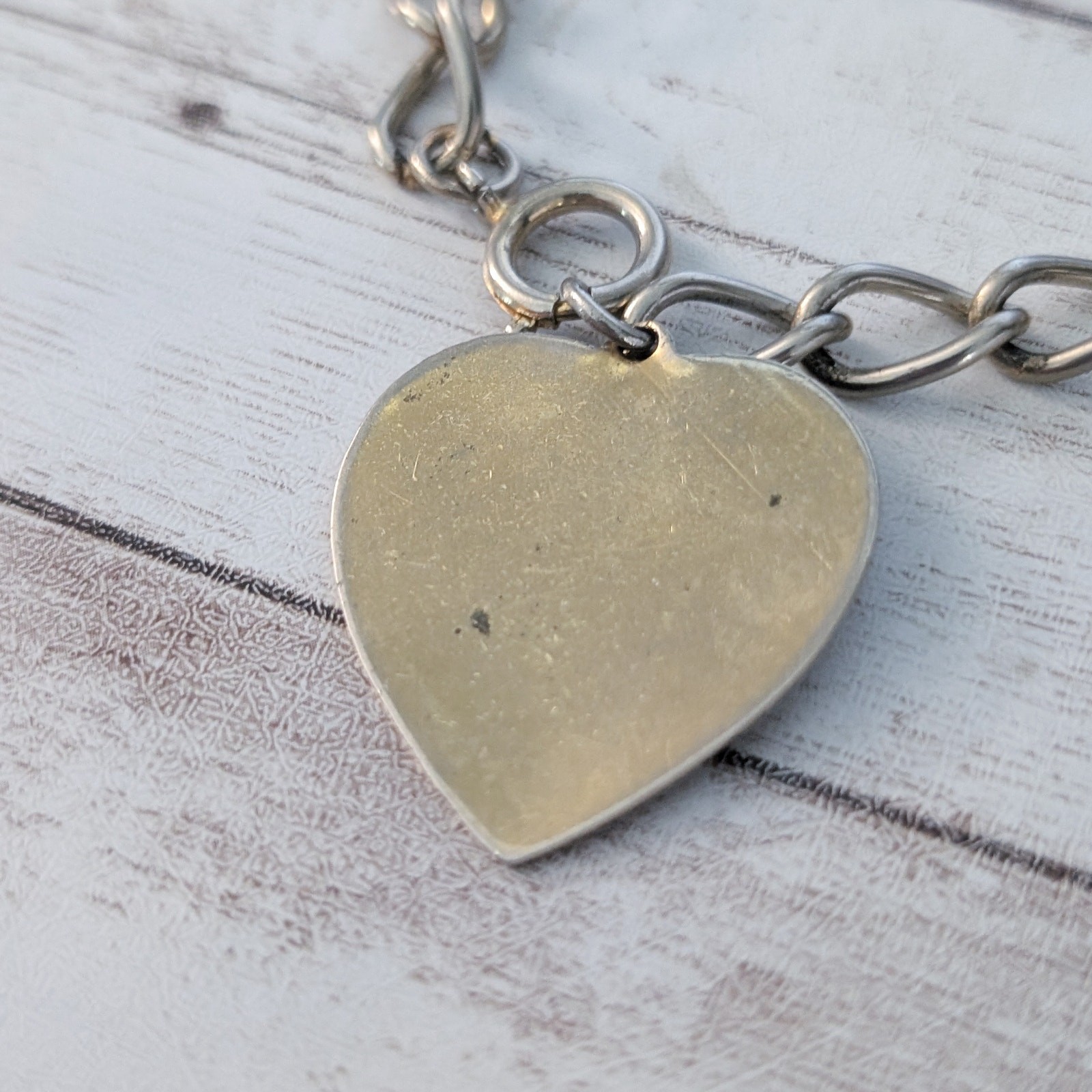 Vintage Bracelet with Heart Charm – Heavy Discoloration and Multiple Marks