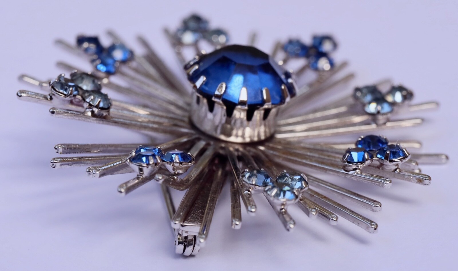 Sarah Coventry Signed “Coventry” Silver Tone Starburst Brooch Blue Rhinestones