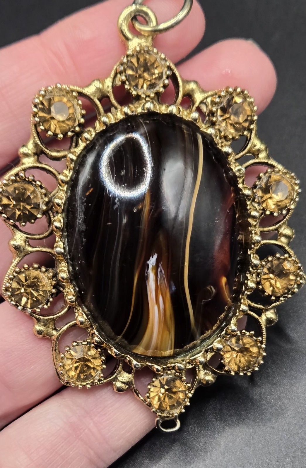 Vintage Ornate Gold Tone Oval Pendant Brown Black Stone Decorative Accents