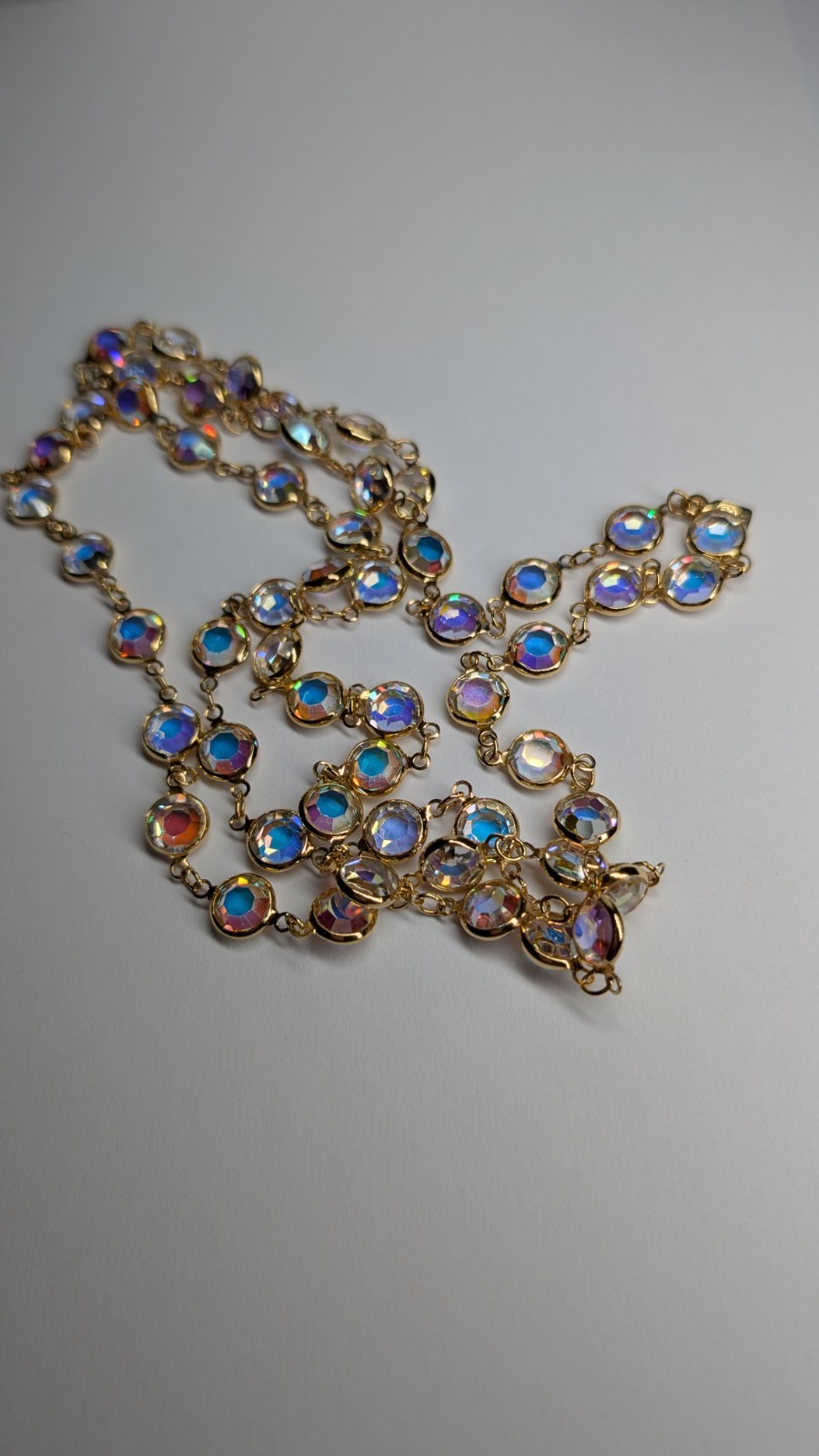 Vintage SWAROVSKI aurora borealis crystal open back bezel set necklace 36″