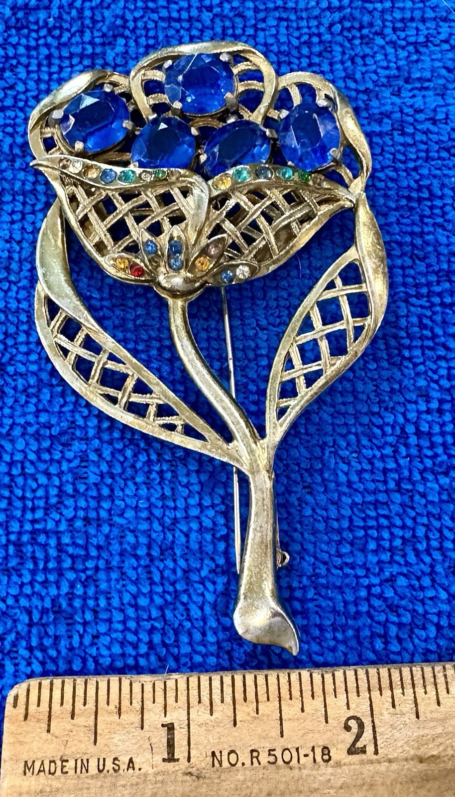 vintage “Little Nemo” rhinestone flower basket brooch