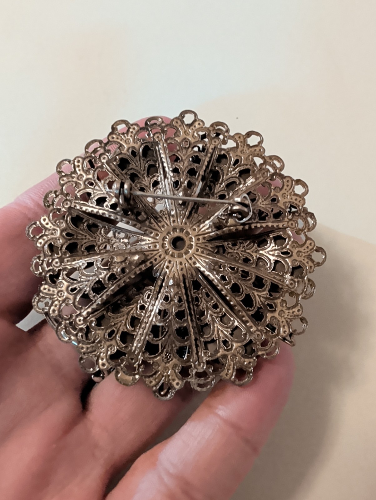 Vintage filigree Bronze Tone Brooch. UV Reactive. 2.5″